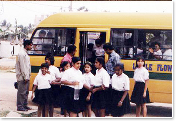 ASCT_Pictures_children infront of the school van